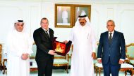 Qatar Chamber’s (QC) First Vice-Chairman, Mohamed bin Ahmed bin Towar Al Kuwari (second right) presenting a memento to the visiting Deputy Minister of Agriculture of Cuba, Maury Hechavarria Bermudez (second left), in the presence of QC Board Member, Moham