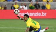 Neymar of Brazil stumbles during the International Friendly football match between Brazil and Peru at the Los Angeles Memorial Coliseum, in Los Angeles, California on September 10, 2019. Peru went on to win 1-0. / AFP / Mark RALSTON