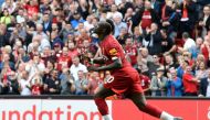 Liverpool's Senegalese striker Sadio Mane celebrates after he scores the team's second goal during the English Premier League football match between Liverpool and Newcastle at Anfield in Liverpool, north west England on September 14, 2019.  AFP / Paul ELL