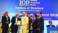 Dr. R Seetharaman, CEO of Doha Bank, receiving the professional excellence award at the event.