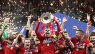 FILE PHOTO:   Liverpool's Jordan Henderson celebrates with the trophy and teammates after winning the Champions League Final REUTERS/Carl Recine
