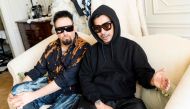 Fashion designers Vin + Omi pose for photograph during an interview with AFP at the Savoy Hotel in London on September 13, 2019.  AFP / Niklas Halle'n