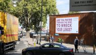 A billboard warning of high air pollution in Chelsea, west London, in an undated handout photograph by Central Office of Public Interest