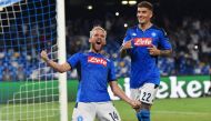 Napoli's Belgian forward Dries Mertens celebrates after scoring a penalty during the UEFA Champions League Group E football match Napoli vs Liverpool on September 17, 2019 at the San Paolo stadium in Naples. / AFP / Andreas SOLARO