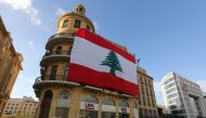 A Lebanese flag hangs from a building in downtown Beirut, Lebanon, November 21, 2017. Reuters/ Aziz Taher