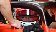 Ferrari's Monegasque driver Charles Leclerc is pictured in the pits as he takes part in the first practice session for the Formula One Singapore Grand Prix at the Marina Bay Street Circuit in Singapore on September 20, 2019. / AFP / Mladen ANTONOV