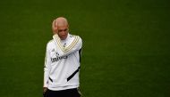  Real Madrid's French coach Zinedine Zidane attends a training session at the Ciudad Real Madrid training ground in Valdebebas, Madrid on September 21, 2019 on the eve of the Spanish League football match against Sevilla. / AFP / PIERRE-PHILIPPE MARCOU