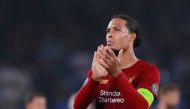 Liverpool's Virgil van Dijk applauds fans after the match Action Images via Reuters/Andrew Couldridge