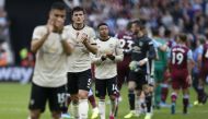 Manchester United's English defender Harry Maguire gestures at the final whistle during the English Premier League football match between West Ham United and Manchester United at The London Stadium, in east London on September 22, 2019.   AFP / Ian KINGTO