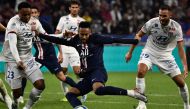 Paris Saint-Germain's Brazilian forward Neymar kicks shoots to score a goal during the French L1 football match between Olympique Lyonnais (OL) and Paris Saint-Germain (PSG) at the Groupama stadium on September 22, 2019 in Decines-Charpieu, near Lyon. / A