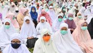 Indonesians gather for special prayers asking for rain in Pekanbaru, Riau province on September 13, 2019, as smog from rainforest fires envelop the Southeast Asian region. AFP/Adek Berry