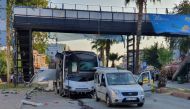 A bus carrying police is seen after hit by a bomb attack in Adana, Turkey, September 25, 2019. Gokhan Keskinci/Demiroren News Agency (DHA) via REUTERS