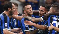 Inter Milan's Italian defender Danilo D'Ambrosio (2ndR) celebrates with (FromL) Inter Milan's Uruguayan defender Diego Godin, Inter's Italian defender Cristiano Biraghi and Inter Milan's Croatian defender Marcelo Brozovic after opening the scoring during 