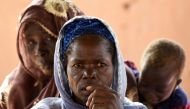 A family, who is among the 300,000 internally displaced because of jihadist violence in northern and eastern Burkina Faso, is pictured on September 17, 2019 in the village of Yagma near Ouagadougou. AFP / Issouf Sanogo 