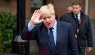 Britain's Prime Minister Boris Johnson leaves The Midland hotel, near the Manchester Central convention complex in Manchester, northwest England on September 29, 2019, on the first day of the annual Conservative Party conference. AFP / OLI SCARFF