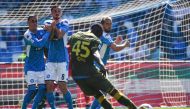 Brescia's Italian forward Mario Balotelli (Front) shoots a free kick as (FromL) Napoli's Spanish forward Jose Callejon, Napoli's Spanish defender Fabian Ruiz and Napoli's Belgian forward Dries Mertens jump to defend during the Italian Serie A football mat