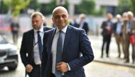 Britain's Chancellor of the Exchequer Sajid Javid arrives at The Midland hotel opposite the Manchester Central convention complex on the second day of the annual Conservative Party conference at the in Manchester, north-west England on September 30, 2019.