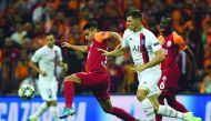 Galatasaray’s Colombian forward Radamel Falcao (left) vies with Paris Saint-Germain’s Belgian defender Thomas Meunier during the UEFA Champions League football match at Ali Sami Yen Spor Kompleksi in Istanbul yesterday.