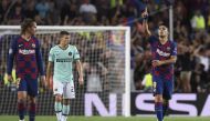 Barcelona's Uruguayan forward Luis Suarez celebrates his goal during the UEFA Champions League Group F football match between Barcelona and Inter Milan at the Camp Nou stadium in Barcelona, on October 2, 2019. / AFP / Josep Lago 