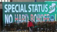 A billboard in west Belfast erected by Republican Party Sinn Fein calling for a special status for northern Ireland with respect to Brexit and no hard borders in Ireland on December 08, 2017. AFP / Paul Faith