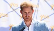 FILE PHOTO: Britain's Prince Harry, the Duke of Sussex, speaks at the Youth Employment Services (YES) Hub as he and his wife Meghan, the Duchess of Sussex, visit a township in Johannesburg, South Africa, October 2, 2019. Facundo Arrizabalaga/File Photo