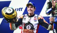 Repsol Honda Team Spanish rider Marc Marquez celebrates on the podium after winning the MotoGP race for the Thailand Grand Prix at Buriram International Circuit in Buriram on Sunday.