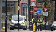 Police officers are seen outside the Arndale shopping centre after several people were stabbed in Manchester, Britain October 11, 2019. (REUTERS/Peter Powell)