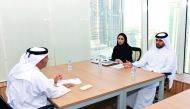 QIB officials interviewing a candidate.