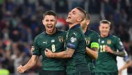 Italy's midfielder Jorginho (L) celebrates with Italy's midfielder Marco Verratti after scoring his team's first goal during the UEFA Euro 2020 Group J qualifier football match between Italy and Greece at the Stadio Olimpico stadium in Rome, on October 12