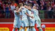 Poland's forward Arkadiusz Milik (2ndL) celebrates scoring the 2-0 with his team-mates during the Euro 2020 qualifier Group G football match Poland v Macedonia in Warsaw, Poland, on October 13, 2019. / AFP / Lukasz Szelag
