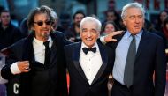 Martin Scorsese, Al Pacino and Robert De Niro pose as they arrive for the screening of 