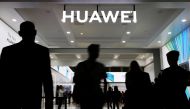 The Huawei logo is pictured at the IFA consumer tech fair in Berlin, Germany, September 6, 2019. REUTERS/Hannibal Hanschke 