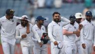 Indian team captain Virat Kohli (C) celebrates with teammates on the fourth day of play after winning the second Test cricket match against South Africa, at the Maharashtra Cricket Association Stadium in Pune on October 13, 2019. AFP / PUNIT PARANJPE 
