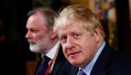 Prime Minister Boris Johnson and British Permanent Representative to the EU Tim Barrow depart the European Council after EU leaders summit in Brussels, October 18, 2019. Reuters/Francois Lenoir