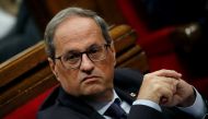Catalan leader Quim Torra sits in the Parliament of Catalonia after Spain's Supreme Court jailed nine separatist leaders, triggering violent protests in the region, in Barcelona, Spain, October 17, 2019. Reuters/Albert Gea