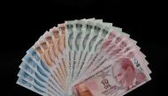 Turkish lira banknotes are seen in this picture illustration in Istanbul, August 14, 2018. Reuters / Murad Sezer