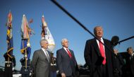Donald Trump speaks to reporters as he arrives for a meeting at the Pentagon, accompanied by Defense Secretary Jim Mattis, VP Mike Pence in Arlington, Virginia, January 18, 2018. Reuters / Carlos Barria