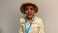 Bamboo entrepreneur Mark Sultan Gersava wear a traditional golden salakót hat at the One Young World Summit in London, October 23, 2019. Thomson Reuters Foundation/K. Sophie Will