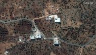 A satellite view of the reported residence of ISIS leader, Abu Bakr al-Baghdadi, according to the source, near the village of Barisha, Syria, collected on September 28, 2019, is shown in this handout image released on October 27, 2019 by Maxar Technologie