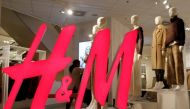 The logo of H and M is seen in a display window of a store in Zurich, Switzerland, January 7, 2019. Reuters / Arnd Wiegmann