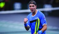 Germany's Jan-Lennard Struff celebrates after winning against Russia's Karen Khachanov during their men's singles tennis match on day two of the ATP World Tour Masters 1000 - Rolex Paris Masters - indoor tennis tournament at The AccorHotels Arena in Paris