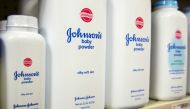 Bottles of Johnson & Johnson baby powder line a drugstore shelf in New York October 15, 2015. Reuters/Lucas Jackson