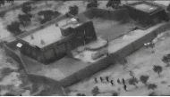 U.S. special forces move towards the compound of Islamic State leader Abu Bakr al-Baghdadi during a raid in the Idlib region of Syria in a still image from video October 26, 2019. Video picture taken October 26, 2019. U.S. Department of Defense/Handout vi