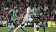 Vinicius Junior (C) of Real Madrid in action against Sidnei (R) of Real Betis Balompie during the La Liga match between Real Madrid CF and Real Betis Balompie at Santiago Bernabeu Stadium on November 02, 2019 in Madrid, Spain. Burak Akbulut - Anadolu 
