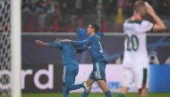 Juventus' Brazilian forward Douglas Costa celebrates with Juventus' Argentine forward Paulo Dybala after scoring a goal during the UEFA Champions League group D football match between FC Lokomotiv Moscow and Juventus at Moscow's RZD Arena stadium on Novem