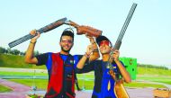 Indian junior trap shooters Vivaan Kapoor (right) and Bhowneesh Mendiratta celebrate after clinching gold and silver medals. Picture: Ebrahim Kutty  