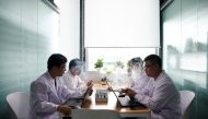 Engineers test e-cigarettes at an evaluation room of Chinese e-cigarette company Relx in Shenzhen, Guangdong province, China July 22, 2019. Reuters/Aly Song
 