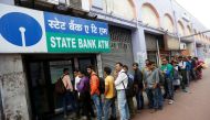 People queue outside an ATM of State Bank of India to withdraw money in Kolkata, November 22, 2016. Reuters / Rupak De Chowdhuri
