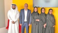 The PwC and QFBA officials after announcing the partnership programme.