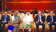 Minister of Finance H E Ali Shareef Al Emadi (centre) and other prominent speakers during the opening session of the 14th Conference on “Enriching the Middle East Economic Future”, yesterday.